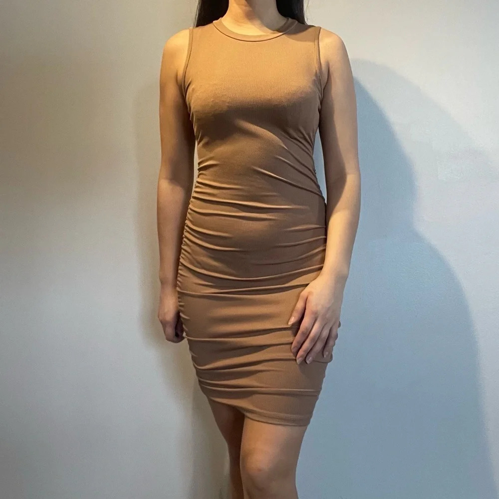 🌟 Elevate Your Style: Woman’s Form-Fitting Stretch Dress, Size Medium, Tan 🌟
